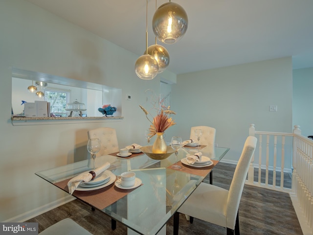 dining area with dark wood-type flooring