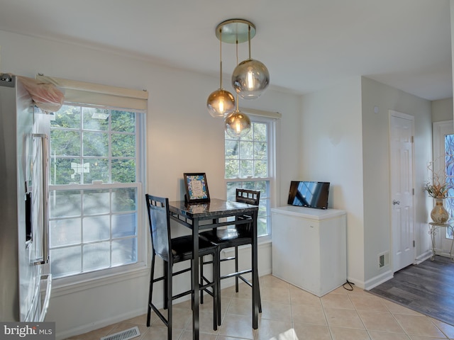 dining room featuring light hardwood / wood-style floors