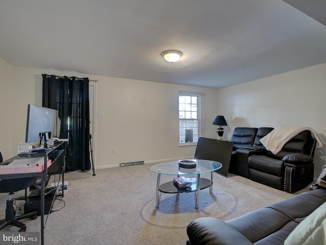 living room with light colored carpet