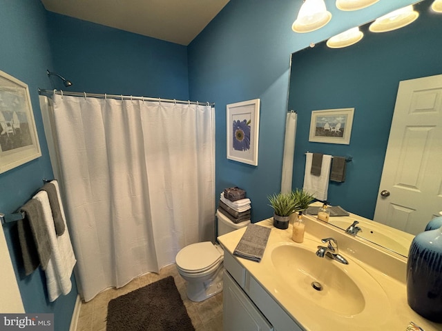 bathroom featuring vanity, a shower with shower curtain, and toilet