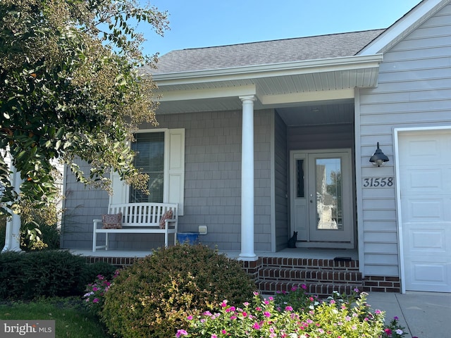 entrance to property with a porch