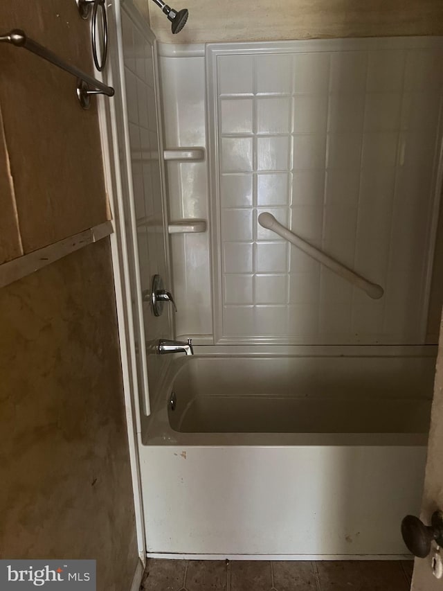 711 6th St, Pocomoke City, MD 21851 - bathroom featuring shower / bath combination and tile patterned floors