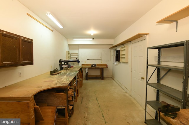 basement with a workshop area