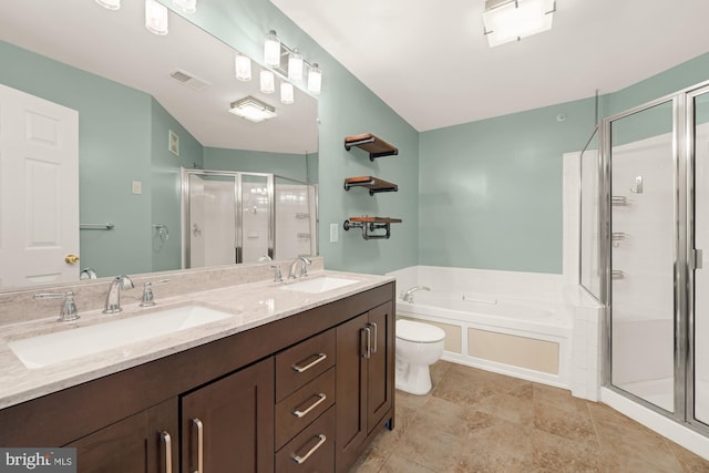 full bathroom with tile patterned floors, toilet, vanity, and shower with separate bathtub