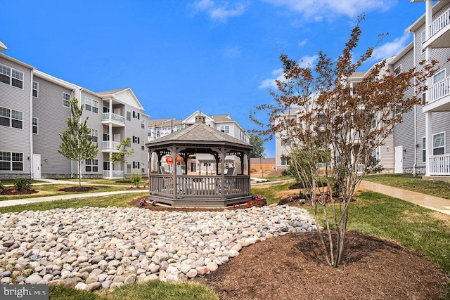 view of home's community featuring a gazebo and a lawn