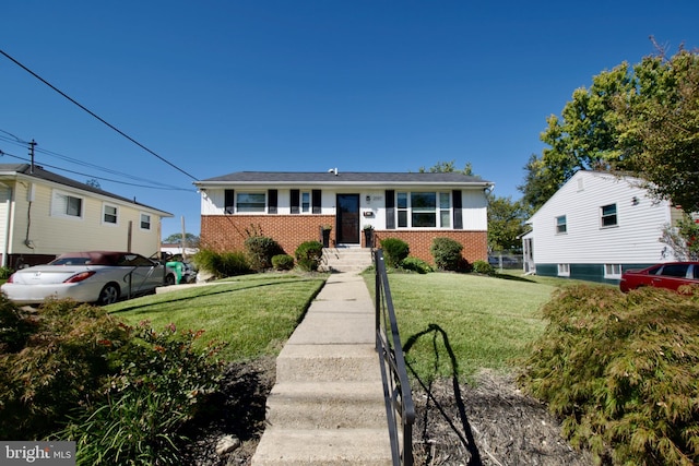 view of front of home with a front lawn