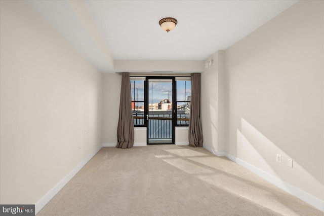 view of carpeted spare room