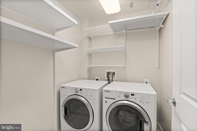 laundry area featuring washer and clothes dryer