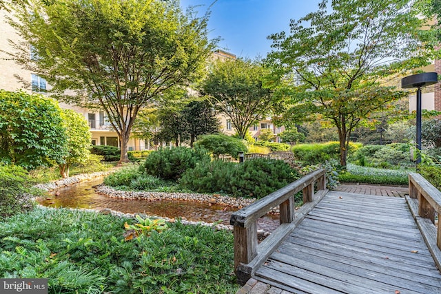 surrounding community featuring a wooden deck