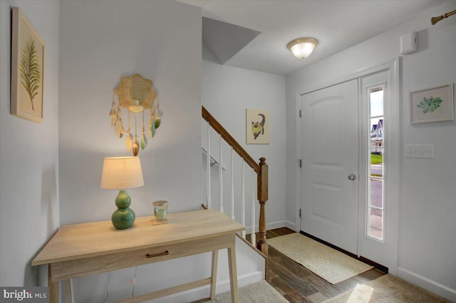 foyer entrance featuring hardwood / wood-style floors