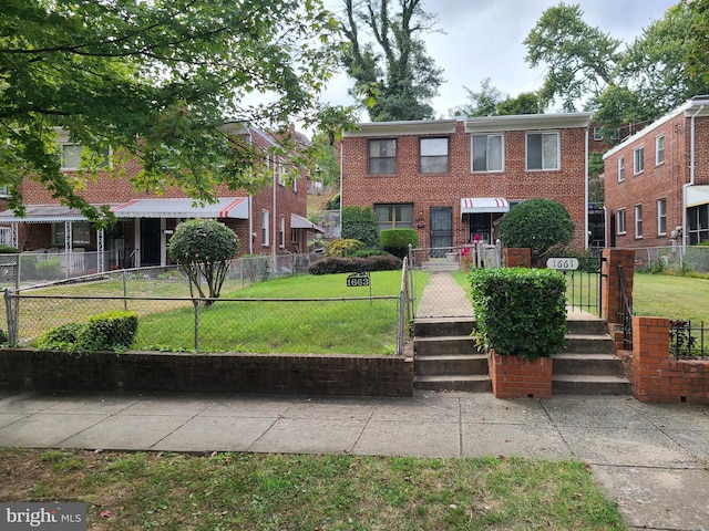 view of front of home with a front lawn