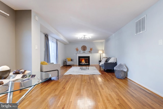 sitting room featuring light wood-type flooring