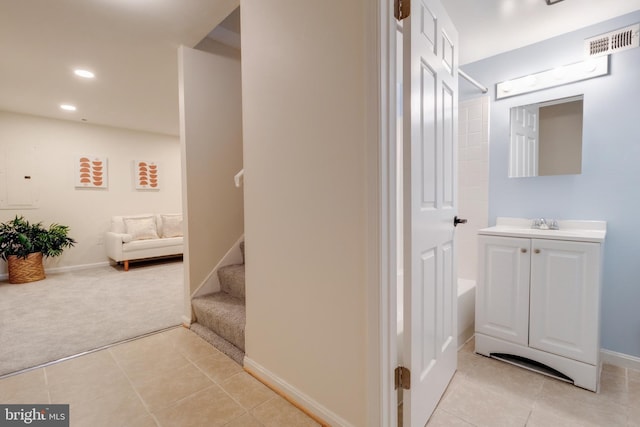 bathroom with vanity and tile patterned floors