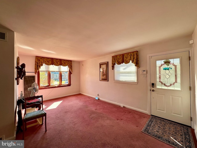 entryway with carpet