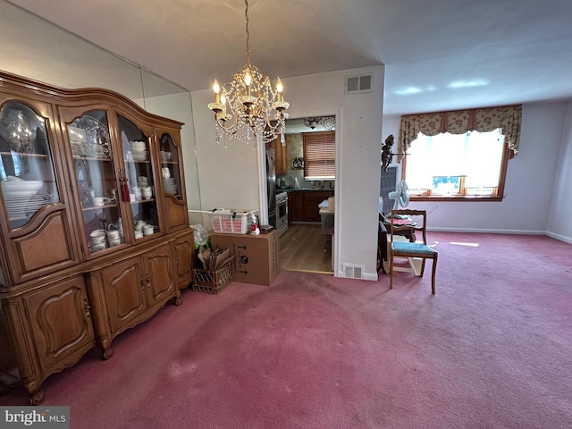 dining room featuring carpet floors