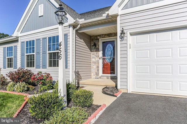 entrance to property featuring a garage