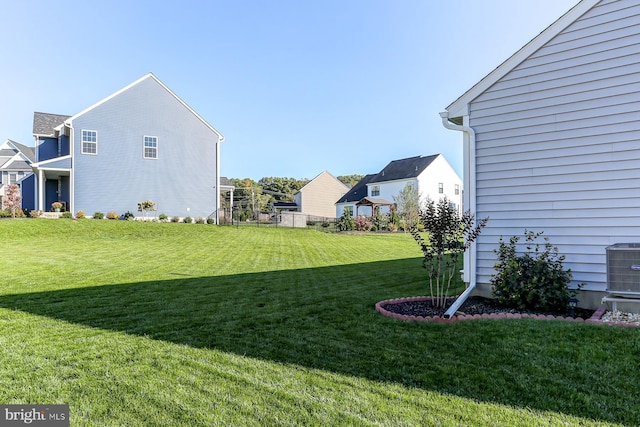 view of yard featuring central AC