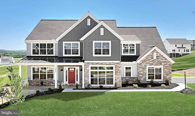 view of front of home with a front lawn