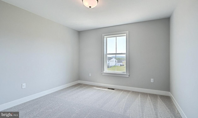 view of carpeted spare room