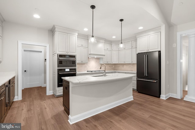 kitchen featuring light hardwood / wood-style flooring, white cabinetry, stainless steel appliances, and sink