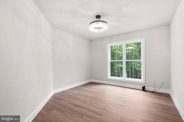 spare room with light wood-type flooring