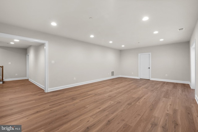 empty room with light wood-type flooring