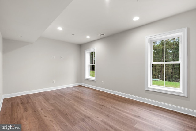 empty room with light wood-type flooring