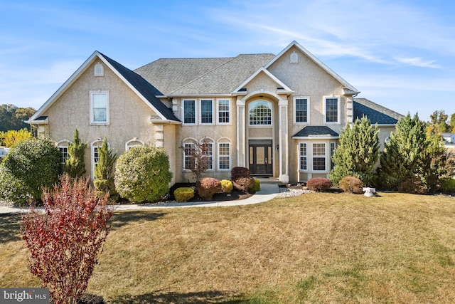 view of front property with a front lawn