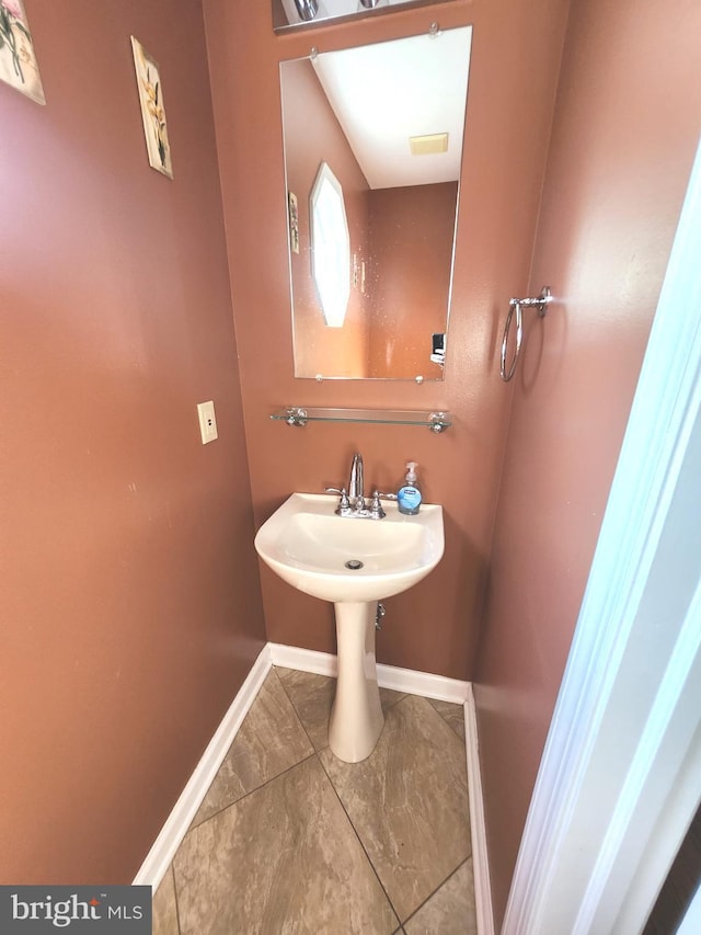 bathroom featuring tile patterned flooring