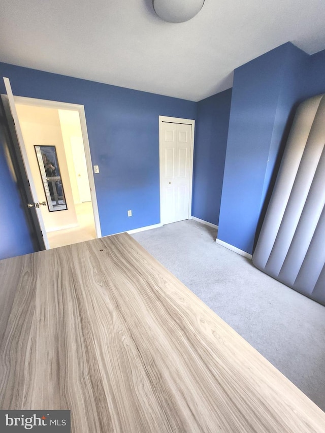 spare room featuring carpet flooring