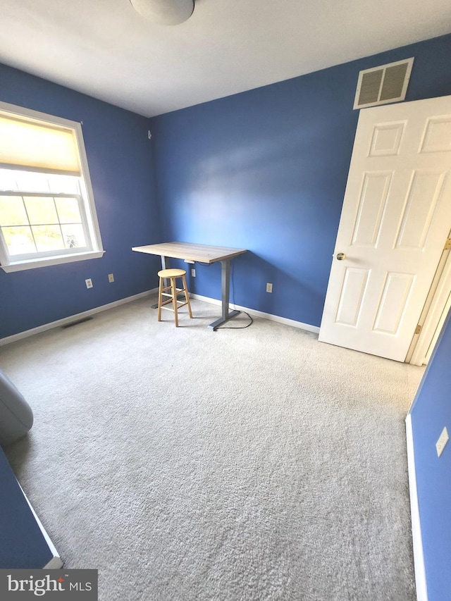 view of carpeted home office