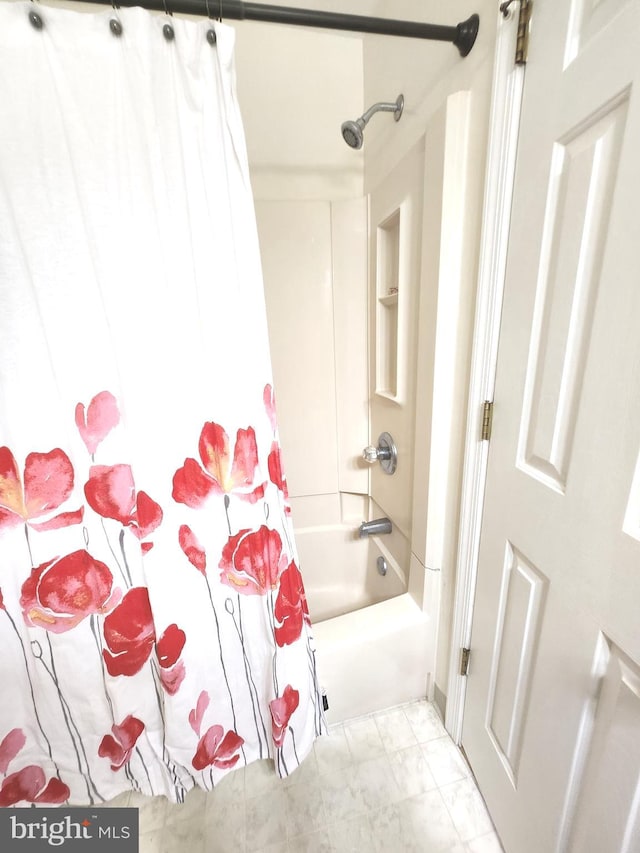 bathroom featuring shower / bath combination with curtain