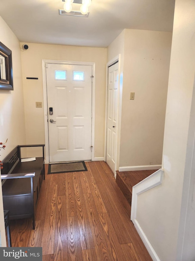 entrance foyer with hardwood / wood-style flooring