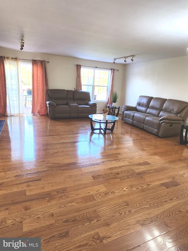 living room featuring dark hardwood / wood-style floors