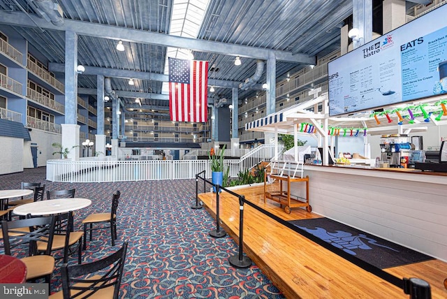 interior space featuring beamed ceiling and wooden ceiling