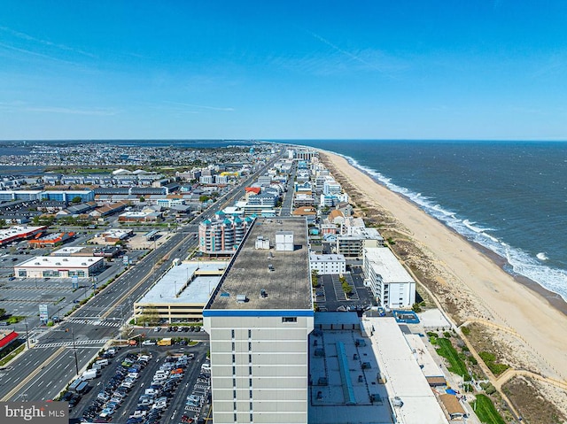 aerial view featuring a water view and a view of the beach