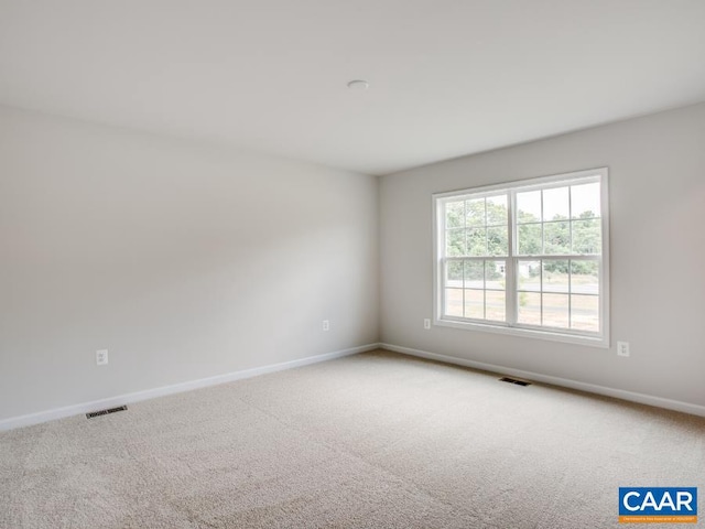 empty room with carpet floors