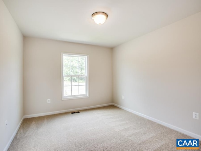 unfurnished room with carpet floors