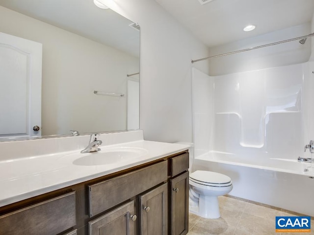 full bathroom featuring vanity, tile patterned flooring, toilet, and washtub / shower combination