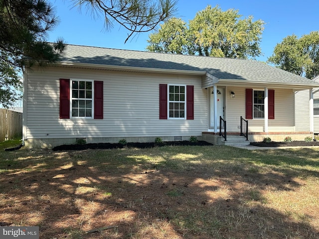 view of front of home with a front yard