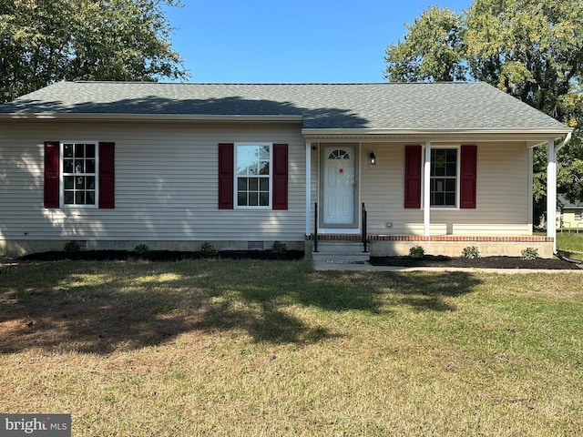 view of front of home featuring a front lawn