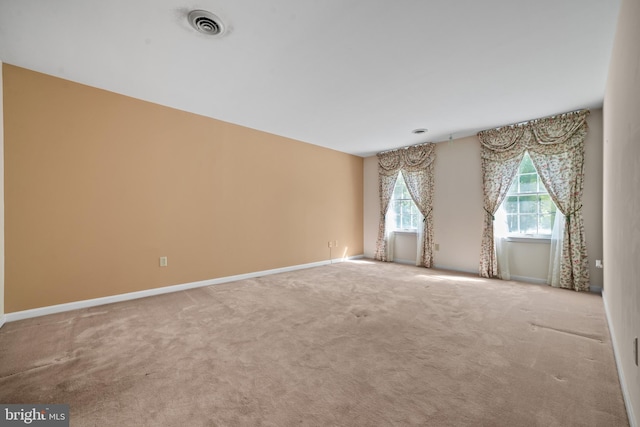 spare room with carpet