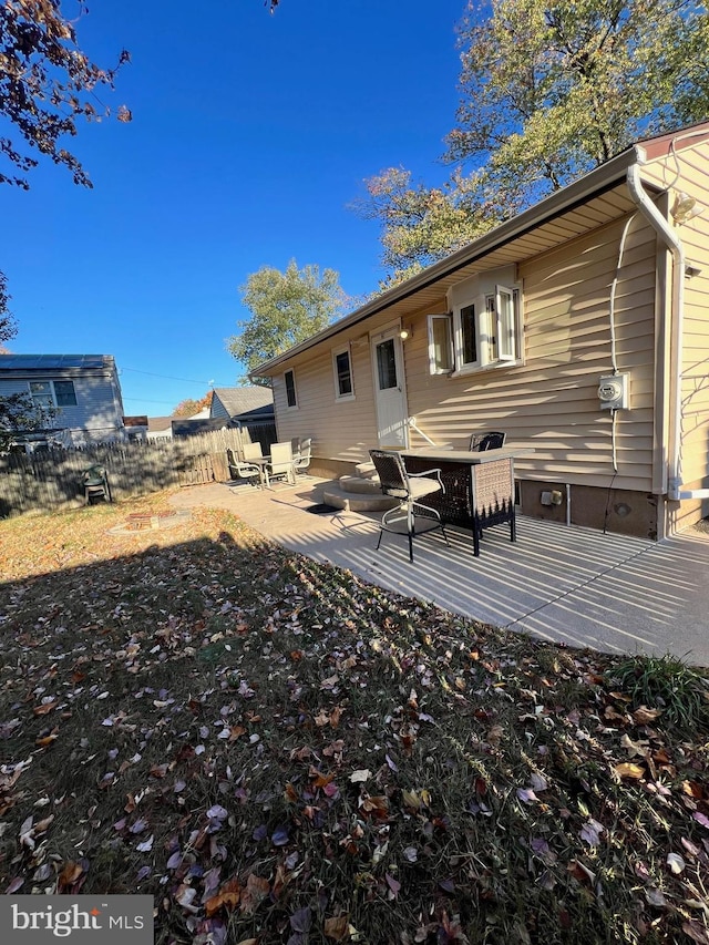 back of property featuring a patio area