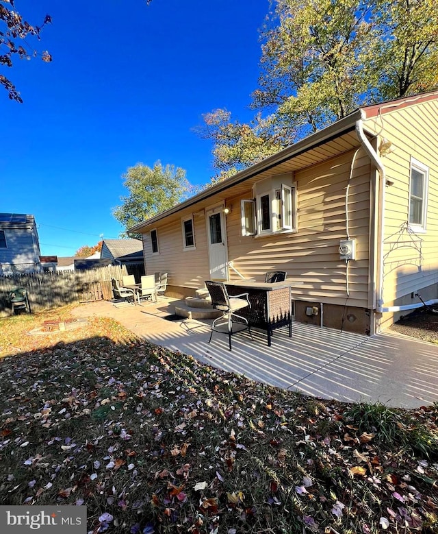 back of property featuring a patio