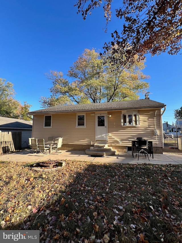 rear view of property featuring a patio