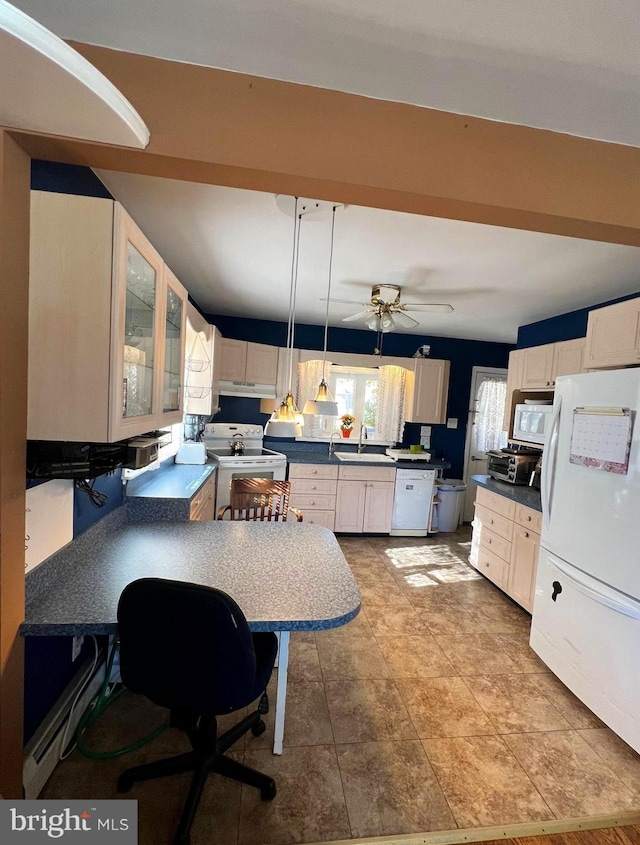 kitchen with ceiling fan, sink, hanging light fixtures, and white appliances