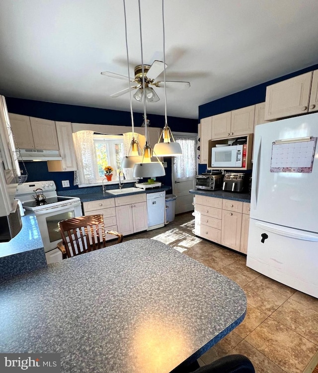 kitchen with white appliances, ceiling fan, sink, and white cabinets