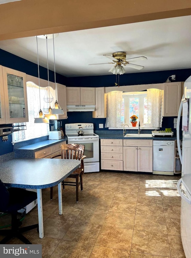 kitchen featuring ceiling fan, pendant lighting, sink, tile patterned floors, and white appliances