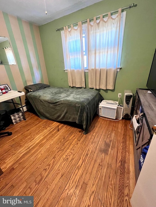 bedroom featuring light hardwood / wood-style floors