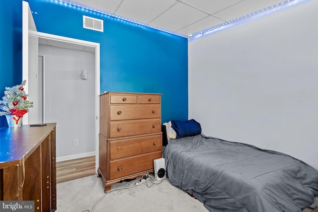 bedroom with light carpet